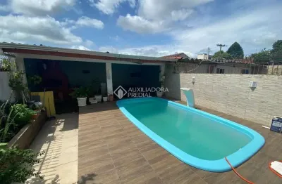 Casa com 3 quartos à venda na Rua Gralhas, 160, Jardim Algarve, Alvorada, 180 m2 por R$ 360.000