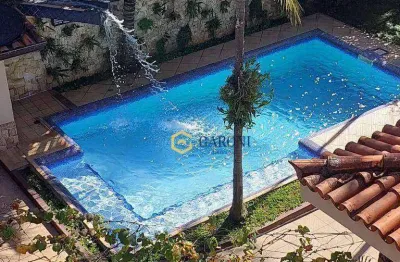 Casa térrea com 4 dormitórios e 4 suítes à venda, 410 m² - parque são domingos - são paulo/sp