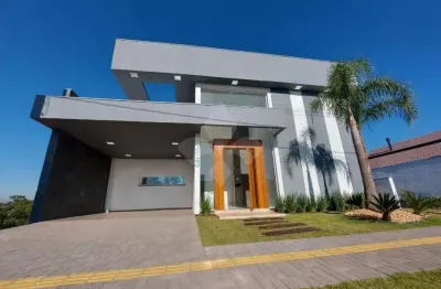 Casa em condomínio fechado com 3 quartos à venda na rua adolfo inácio de barcelos, 1490, centro, gravataí por r$ 1.349.000