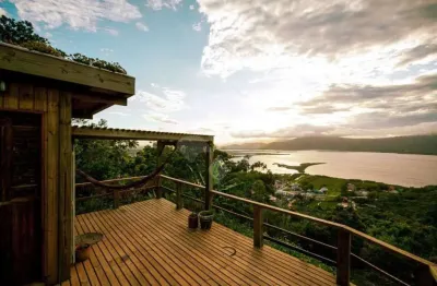 Casa em condomínio fechado com 3 quartos à venda na morro da praia da ferrugem, 2, capão, garopaba por r$ 5.000.000