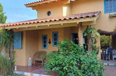 Casa com 3 quartos à venda na badejo, 1, encantada, garopaba por r$ 1.300.000