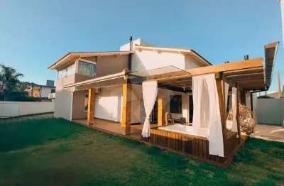 Casa em condomínio fechado com 4 quartos à venda na do travessão, 11, ambrósio, garopaba por r$ 1.580.000