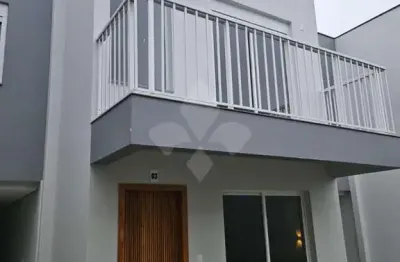 Casa em condomínio fechado com 2 quartos à venda na rodovia  jovino piucco, 142, centro, garopaba por r$ 1.100.000