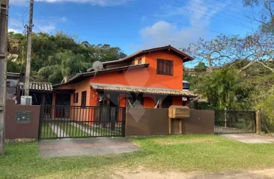 Casa em condomínio fechado com 4 quartos à venda na da praça, 87, capão, garopaba por r$ 1.910.000