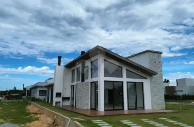 Casa em condomínio fechado com 3 quartos à venda na geral do ouvidor, 04, grama, garopaba por r$ 1.590.000