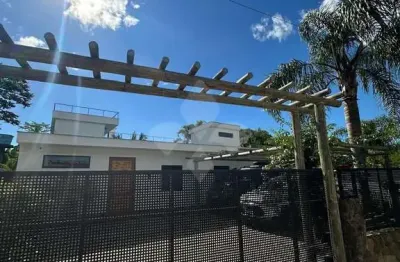 Casa em condomínio fechado com 5 quartos à venda na olivio silva lamas, 109, grama, garopaba por r$ 2.500.000
