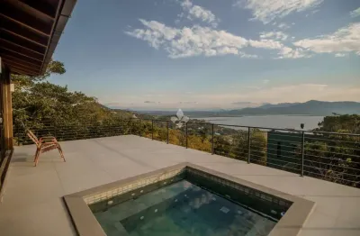 Casa em condomínio fechado com 3 quartos à venda na grp 110, 1, capão, garopaba por r$ 3.750.000