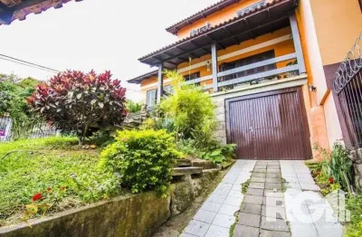 Casa com 5 quartos à venda na Vila Nova, Porto Alegre 