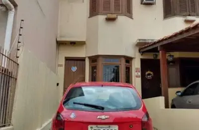 Casa com 3 quartos à venda na zilah totta, 538, rubem berta, porto alegre por r$ 393.000