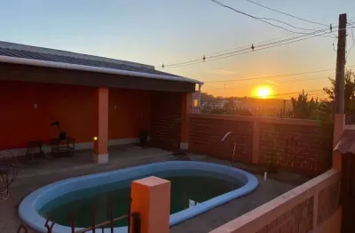 Casa com 3 quartos à venda na avenida tiradentes, 970, aparecida, alvorada por r$ 419.000