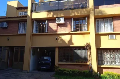 Casa em condomínio fechado com 3 quartos à venda na rua general gomes carneiro, 80, medianeira, porto alegre por r$ 630.000