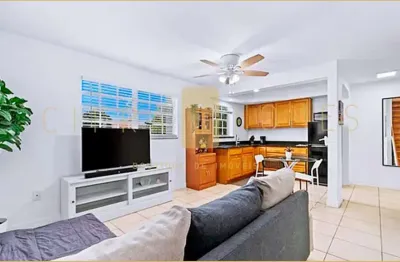 Duplex semi-mobiliado à venda em miami, próximo à brickell e praias. muito conforto e estilo.