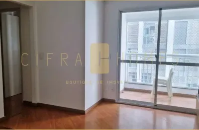 Apartamento de 50m² com sala ampla, varanda iluminada, 2 quartos e cozinha equipada.