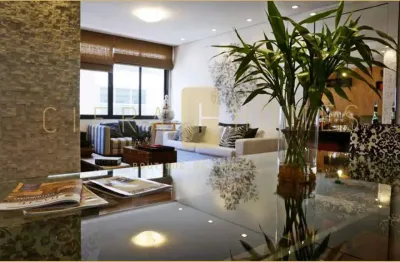 Apartamento de 142 m² com 2 suítes, 3 salas, cozinha gourmet e 2 vagas cobertas próximo à avenida p