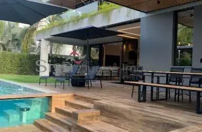 Casa com 4 quartos à venda na rua dos carapanás, 73, jurerê internacional, florianópolis por r$ 13.990.000