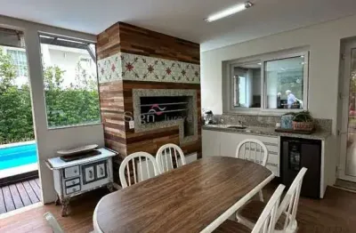 Casa em condomínio fechado com 3 quartos à venda na rodovia haroldo soares glavan, 929, cacupé, florianópolis por r$ 3.600.000