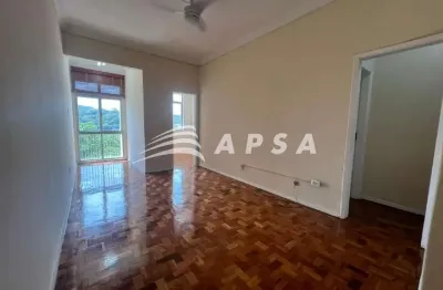 Em uma rua tranquila e residencial de botafogo, surge um apartamento que inspira calma e encanto. lo