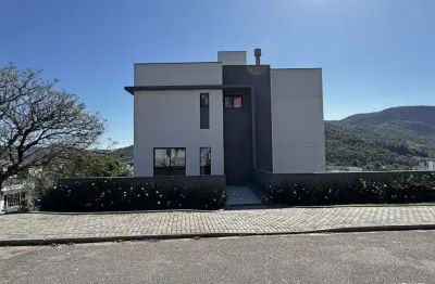 Casa com 4 quartos à venda na rua dos tiés, 470, pedra branca, palhoça por r$ 2.590.000