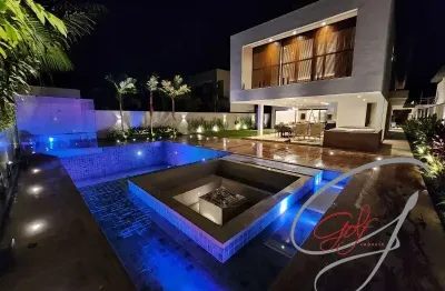 Casa nova localizada em rua larga na riviera de são lourenço, bertioga.