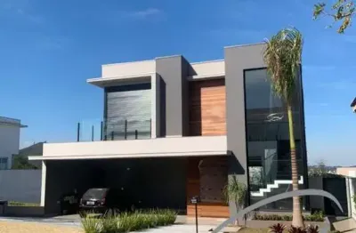 Casa de alto padrão em condomínio fechado em alphaville: 4 suítes, 3 salas, 6 banheiros, 6 vagas, 343m².