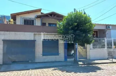 Casa de 03 dormitórios 01 suite com espaço comercial próxima ao centro em santa