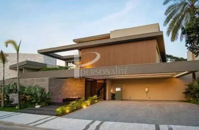 Nobre mansão a venda  no golf club riviera 831m, 7 suites,sala de cinema, com telão na piscina