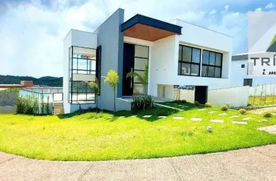 Casa alto padrão com 4 suítes, sendo uma master com closet e hidro, sala com pé direito duplo, área gourmet e piscina. condomínio alphaville ii.