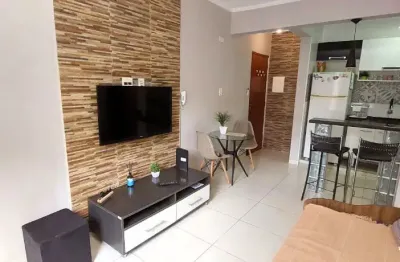Oporunidade!1 dorm. totalmente mobiliado em frente á praia com vaga demarcada