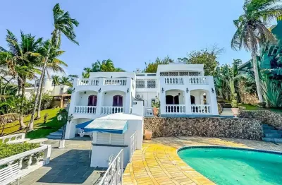 Casa de luxo com vista mar na praia da cocanha | 4 suítes | piscina privativa | 404m²