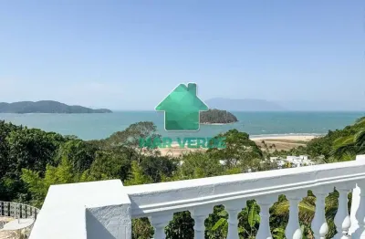 Casa de luxo com vista mar na praia da cocanha | 4 suítes | piscina privativa | 404m²