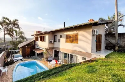 Casa com 4 dormitórios à venda, 248 m² por r$ 690.000,00 - encosta do sol - estância velha/rs