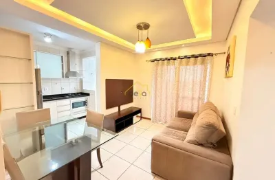 Apartamento mobiliado em andar alto porteira fechada no iririú próximo da igreja são sebastião!!
