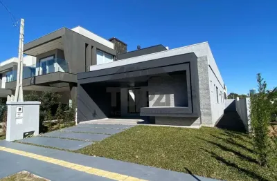 Casa em condomínio fechado com 3 quartos à venda na rua adolfo inácio de barcelos, 1490, centro, gravataí por r$ 1.390.000