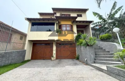 Casa com 4 quartos à venda na rua zeferino dias, 390, sarandi, porto alegre por r$ 1.390.000