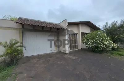 Casa com 3 quartos à venda na rua teixeira de freitas, 761, santo antônio, porto alegre por r$ 1.300.000