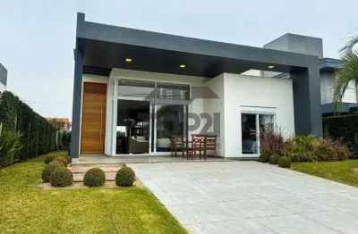 Casa em condomínio fechado com 4 quartos à venda na rua rio novo, 2083, centro, xangri-lá por r$ 2.150.000