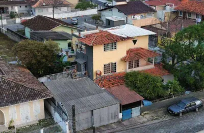 Casa com 5 dormitórios à venda, 412 m² por r$ 1.450.000,00 - centro - palhoça/sc