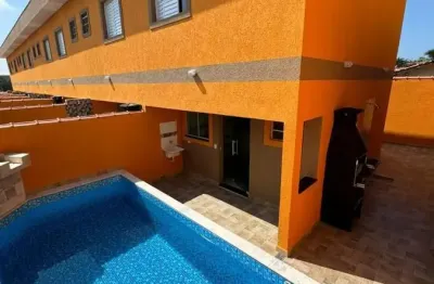 Lindo sobrado na praia lado praia com piscina e churrasqueira