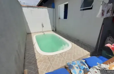 Casa na praia lado praia com piscina, churrasqueira e suíte