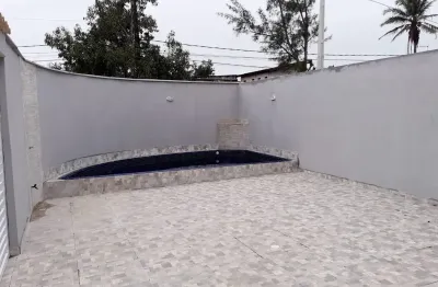 Casa nova na praia em rua pavimentada a 600m do  mar -  piscina e churrasqueira