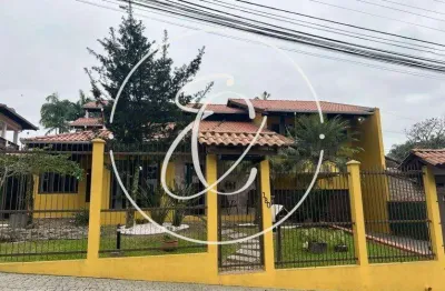 Amplo sobrado semi mobiliado com 4 quartos e área de lazer completa à venda no bom retiro, joinville - sc