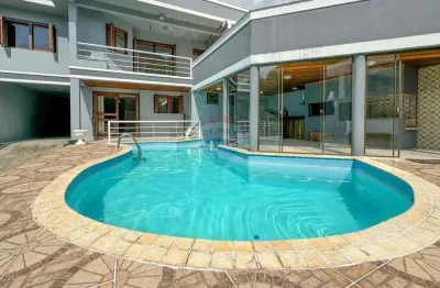 Casa com 4 quartos à venda na Agronomia, Porto Alegre 