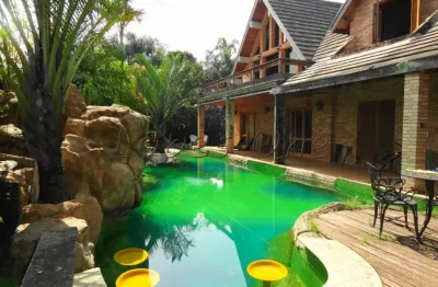 Sobrado 5 suites, piscina em terreno grande no tremembé