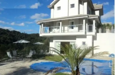 Casa na serra da cantareira em condomínio fechado  casa com 500 m² de área construída 1.010 metros de  terreno com 4 quartos 3 suítes piscina espaço gourmet salão de festas casa de altíssimo padrão!!