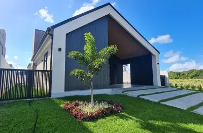 Oportunidade de casa moderna no condomínio alphaville paraiba.