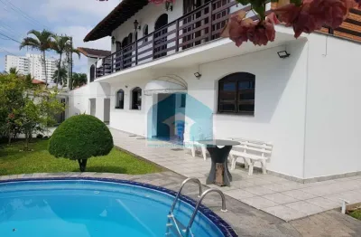 Sobrado de alto padrão no balneario flórida praia grande sp com 3 suítes