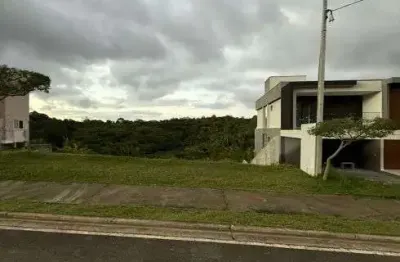 Terreno em condomínio fechado à venda na Rua Guarajuba, Alphaville (Abrantes), Camaçari