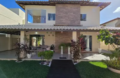 Vilas do atlântico casa de alto padrão 4 suítes com 450m² de área total - oportunidade