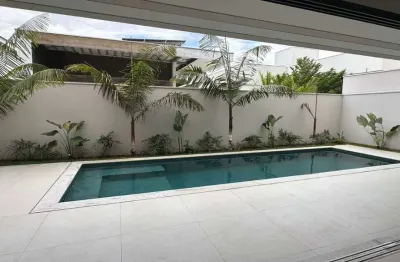 Casa em condomínio fechado com 4 quartos à venda no jardins gênova, uberlândia  por r$ 3.900.000