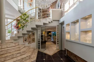 Casa com 3 quartos à venda na avenida general barreto viana, 765, chácara das pedras, porto alegre por r$ 2.295.000